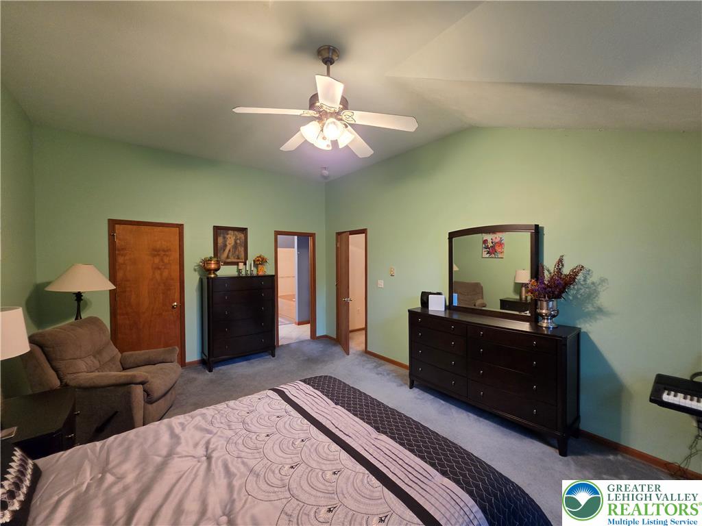 211 Murphy Circle Bushkill, PA 18324 - Photo 10 of 28 Sloped ceilings and soft carpeting create a cozy and inviting bedroom retreat.