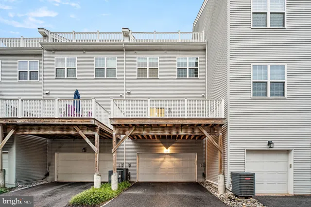a front view of a house with yard