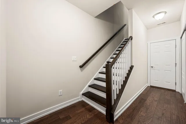 a view of entryway with wooden floor