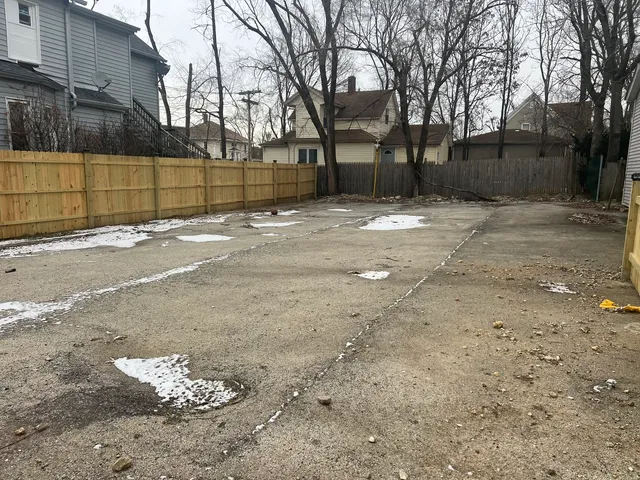 a view of a backyard of the house