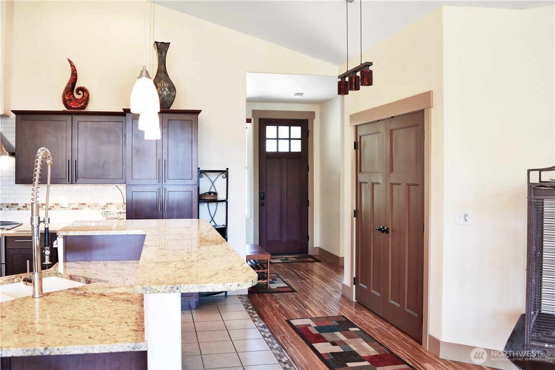 1024 Columbia Point Entiat, WA 98822 - Photo 16 of 22 a living room with lots of furniture and wooden floor