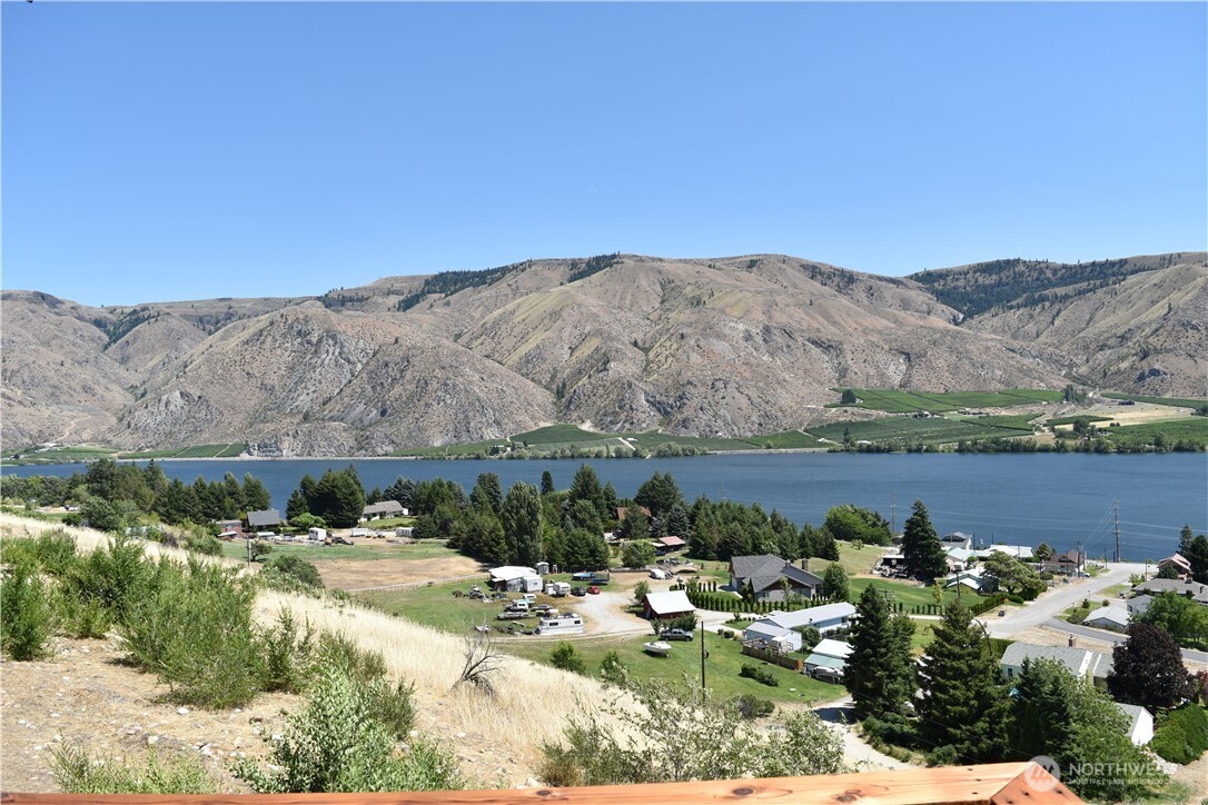 1024 Columbia Point Entiat, WA 98822 - Photo 7 of 22 a view of a lake with a mountain in the background