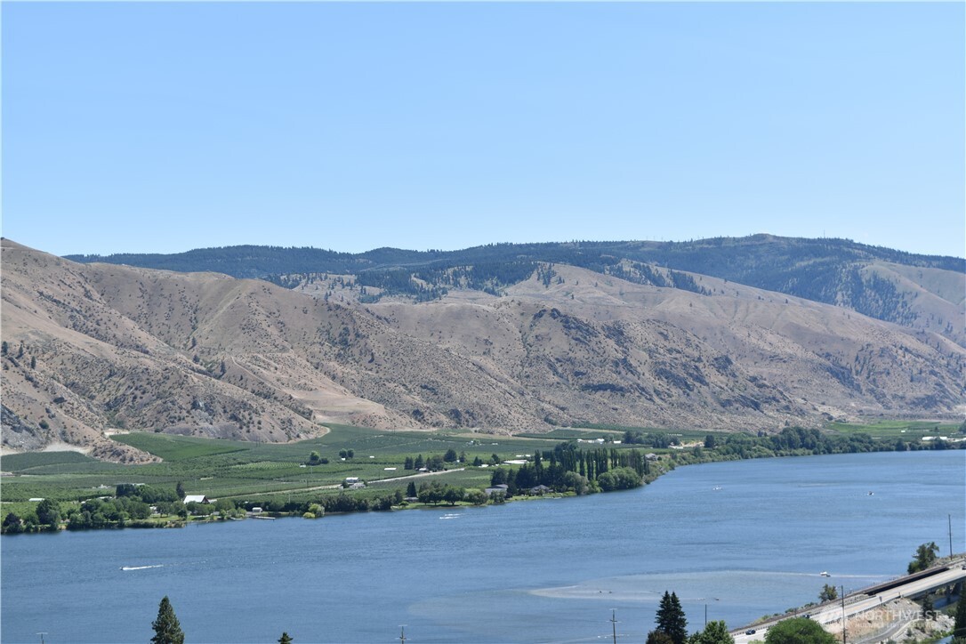 1024 Columbia Point Entiat, WA 98822 - Photo 8 of 22 an aerial view of mountain with wooden fence