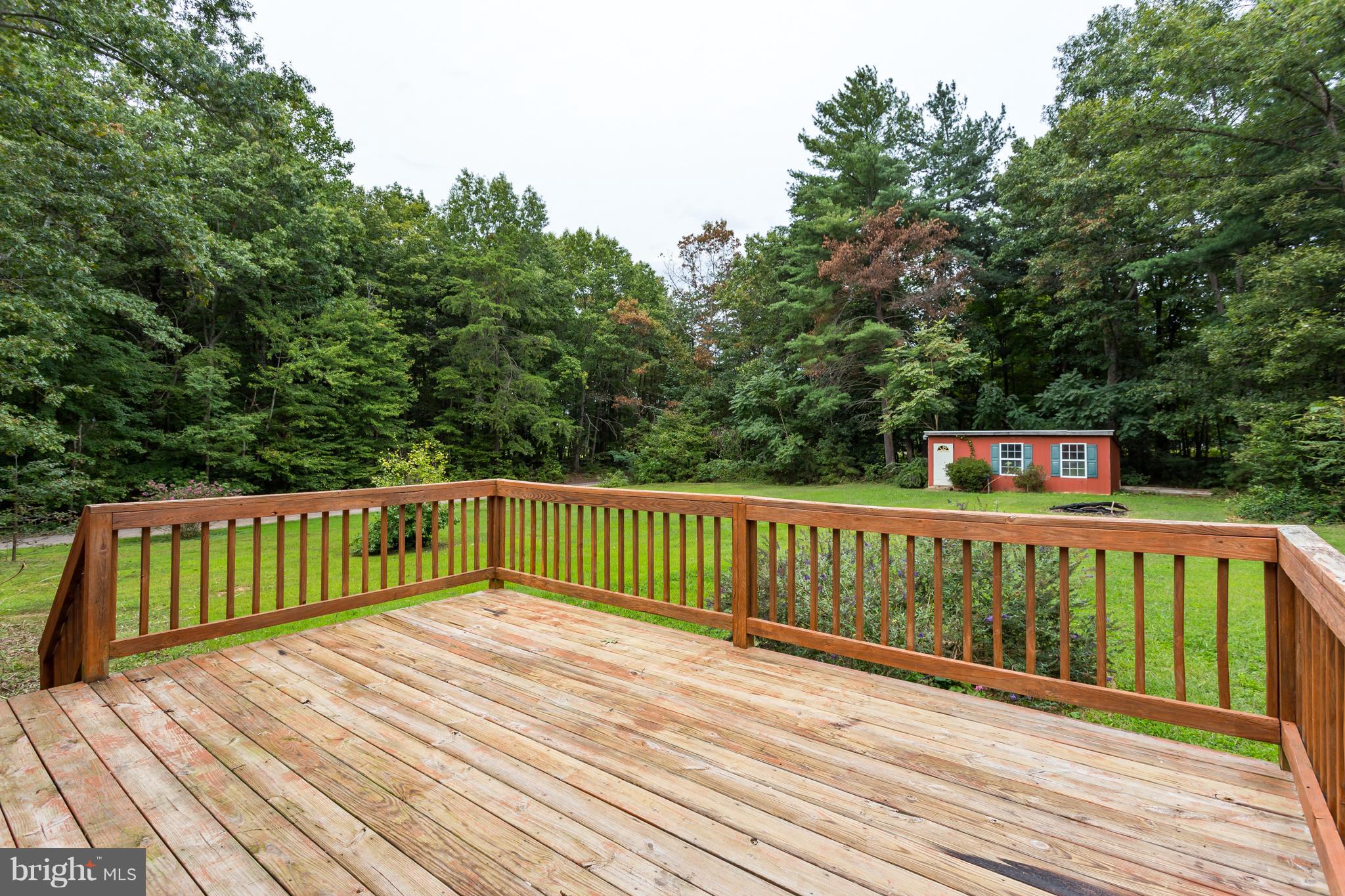 7320 Pine Stake Road Culpeper, VA 22701 - Photo 18 of 23 Large deck and yard for family fun!