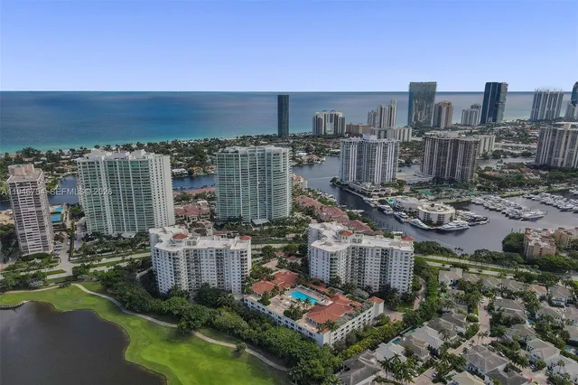 a view of a city with tall buildings
