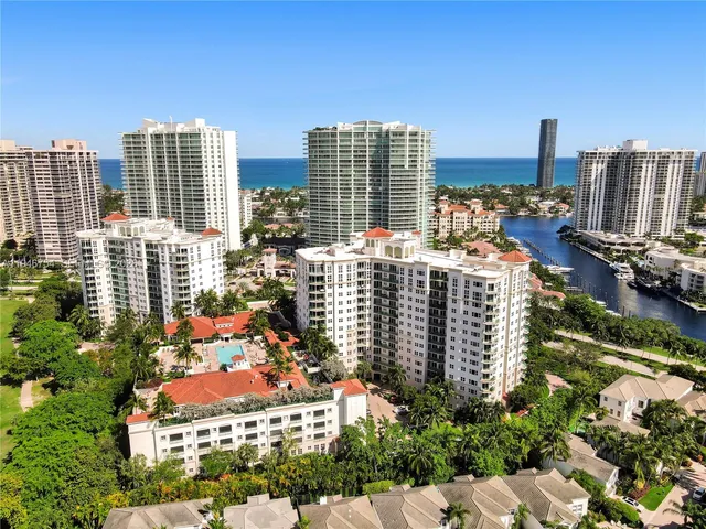 a view of a lake with a building in the background