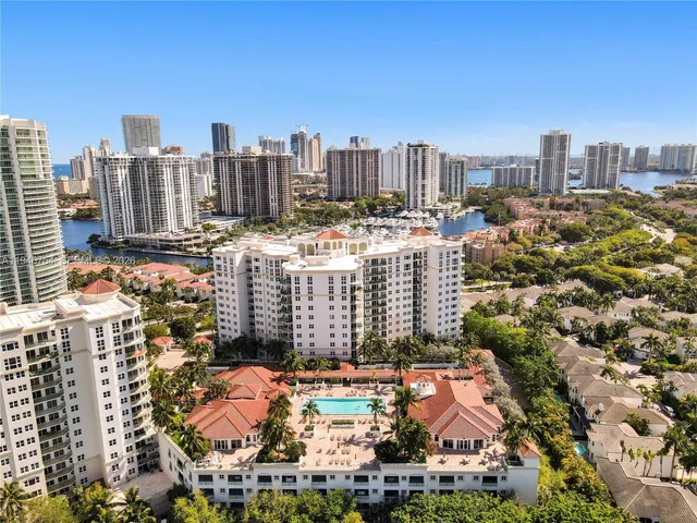 a swimming pool with outdoor seating and yard