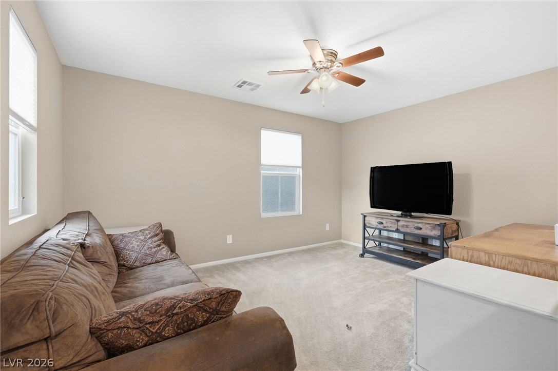 150 Fulgora Street Henderson, NV 89074 - Photo 37 of 92 Upstairs loft featuring light carpet, a ceiling fan, and recessed lighting