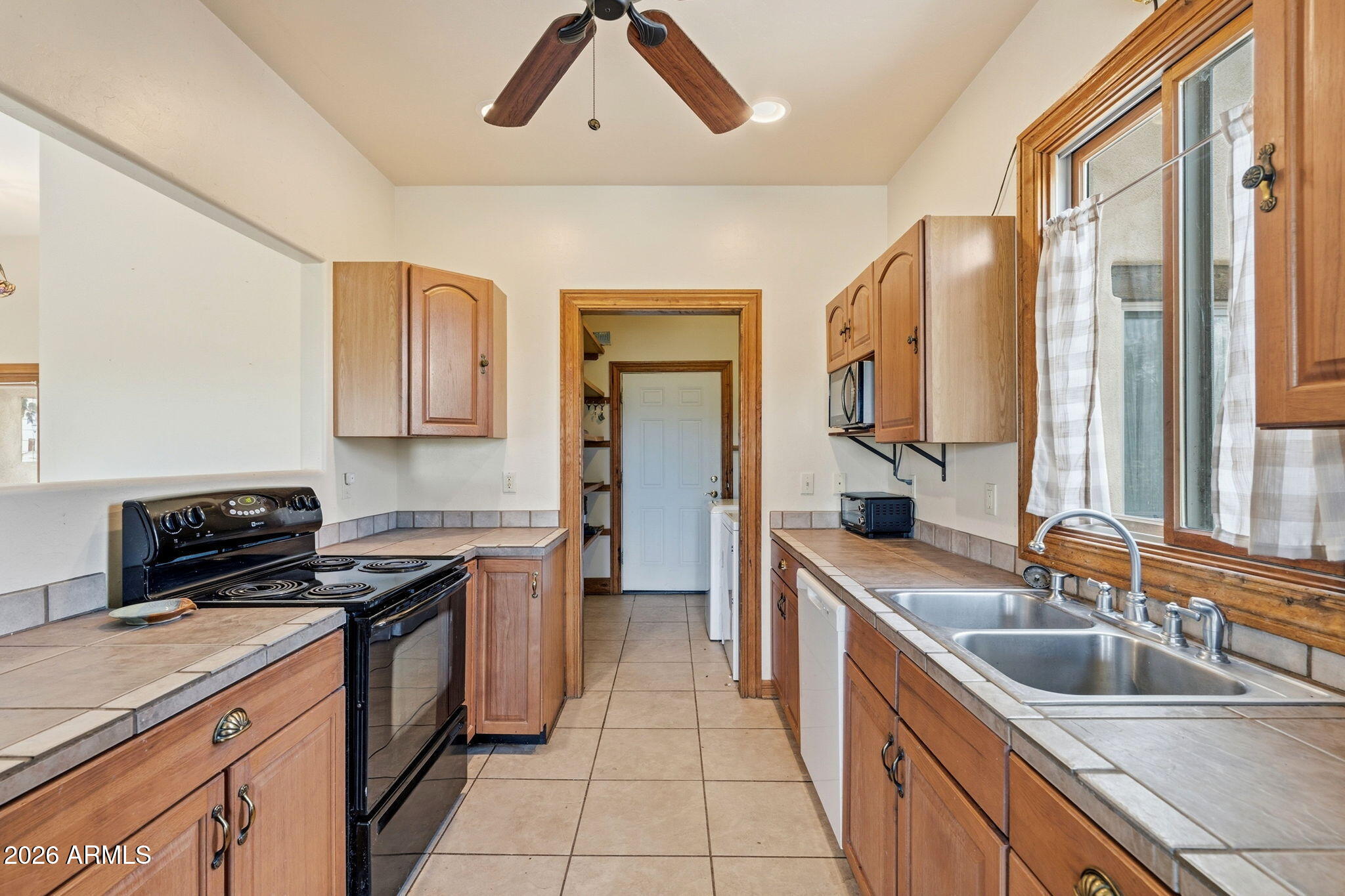 2002 Interstate 19 Frontage Road Tumacacori, AZ 85640 - Photo 13 of 27 Kitchen to Pantry