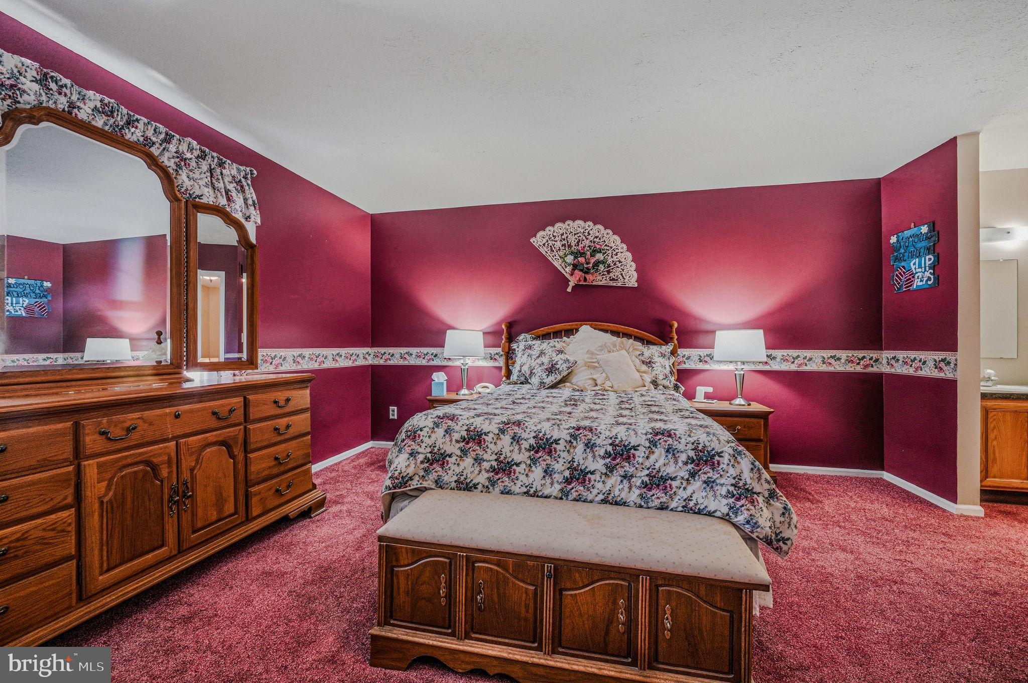 104 Balmoral Way Newark, DE 19702 - Photo 15 of 25 a bedroom with a large bed and a large closet