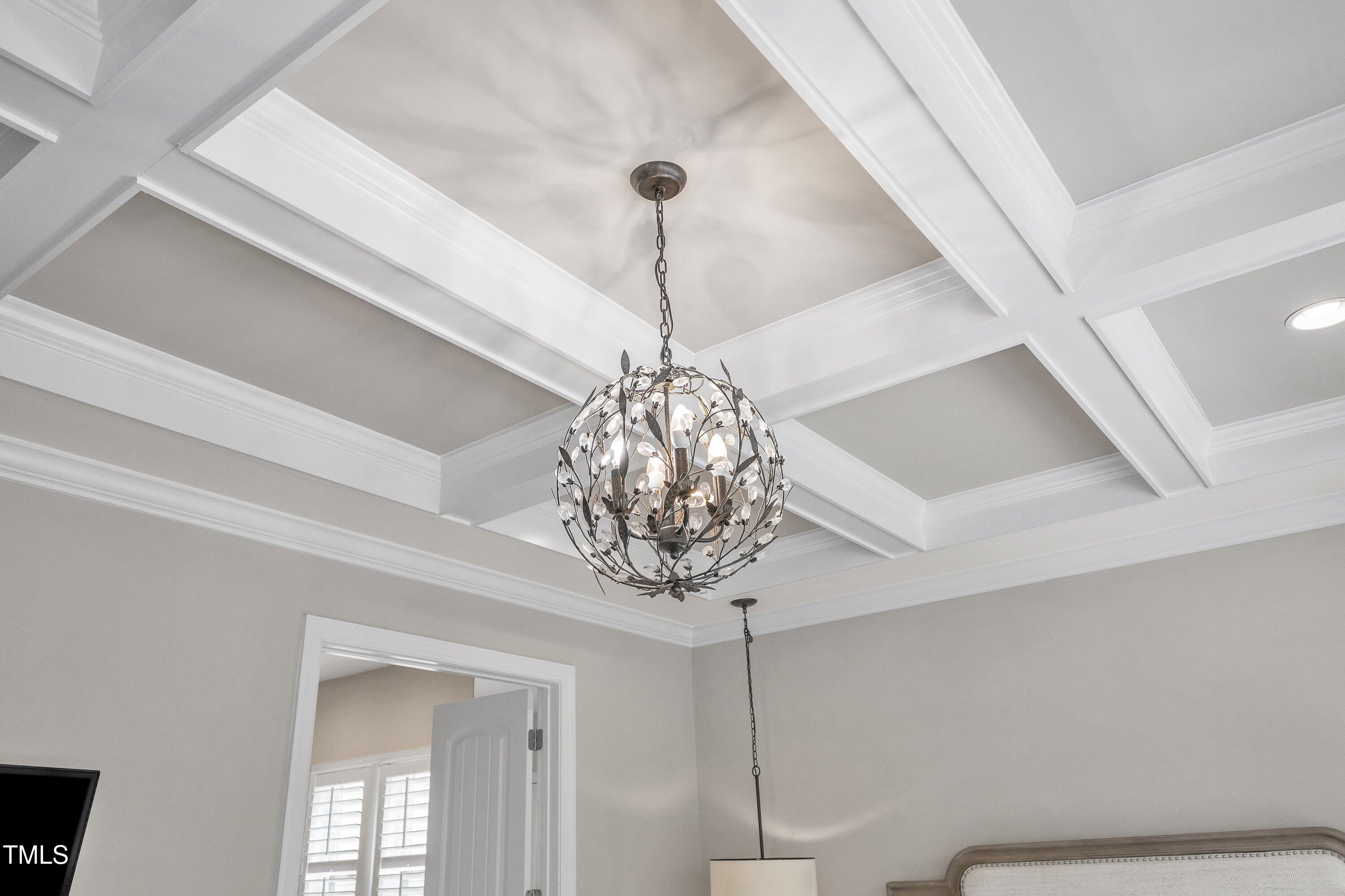 8121 Greys Landing Way Raleigh, NC 27615 - Photo 73 of 95 a view of a chandelier in a room