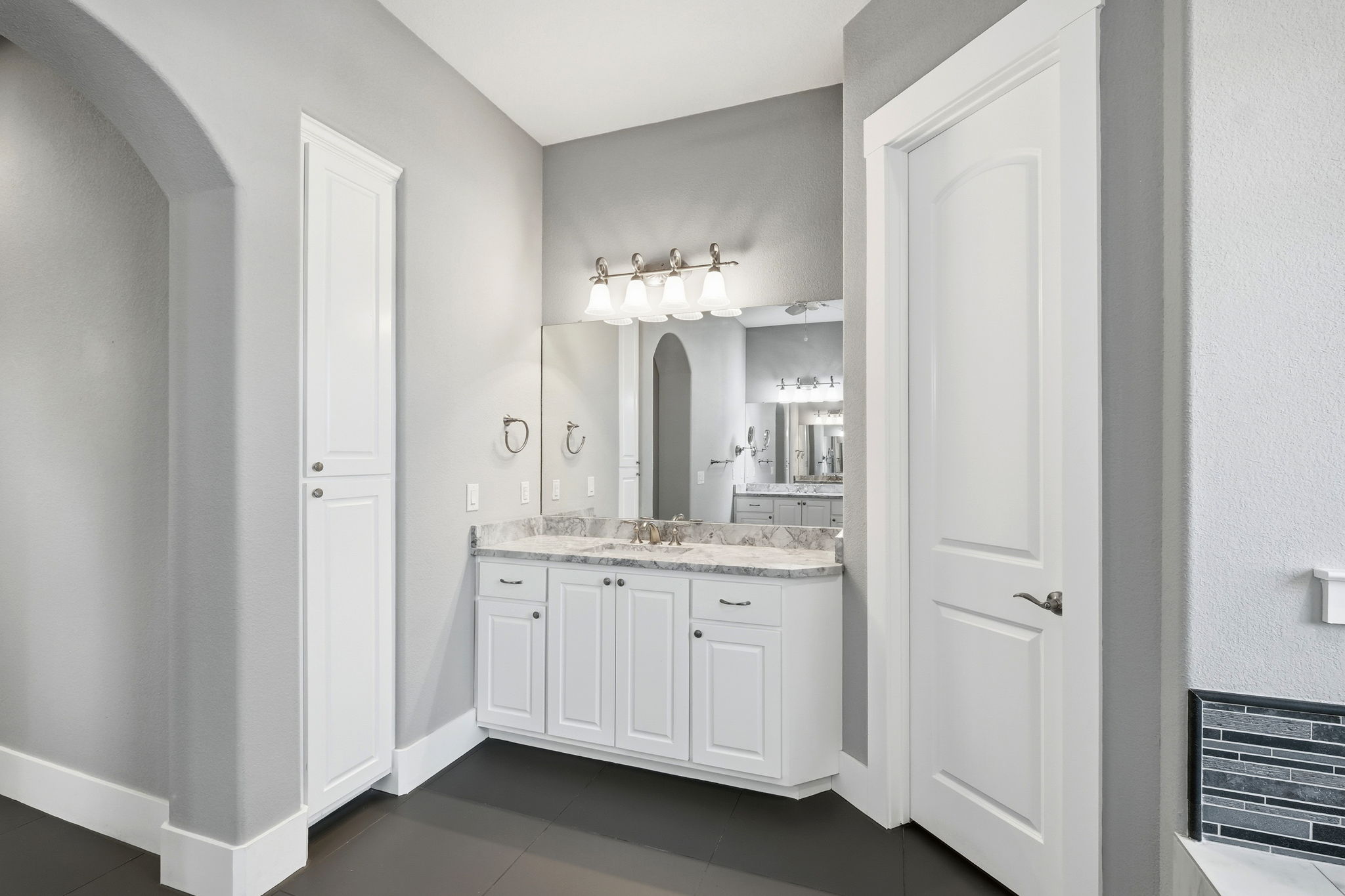 403 Highland Spring Lane Georgetown, TX 78633 - Photo 21 of 40 Full bathroom featuring vanity, dark tile patterned flooring, and a closet