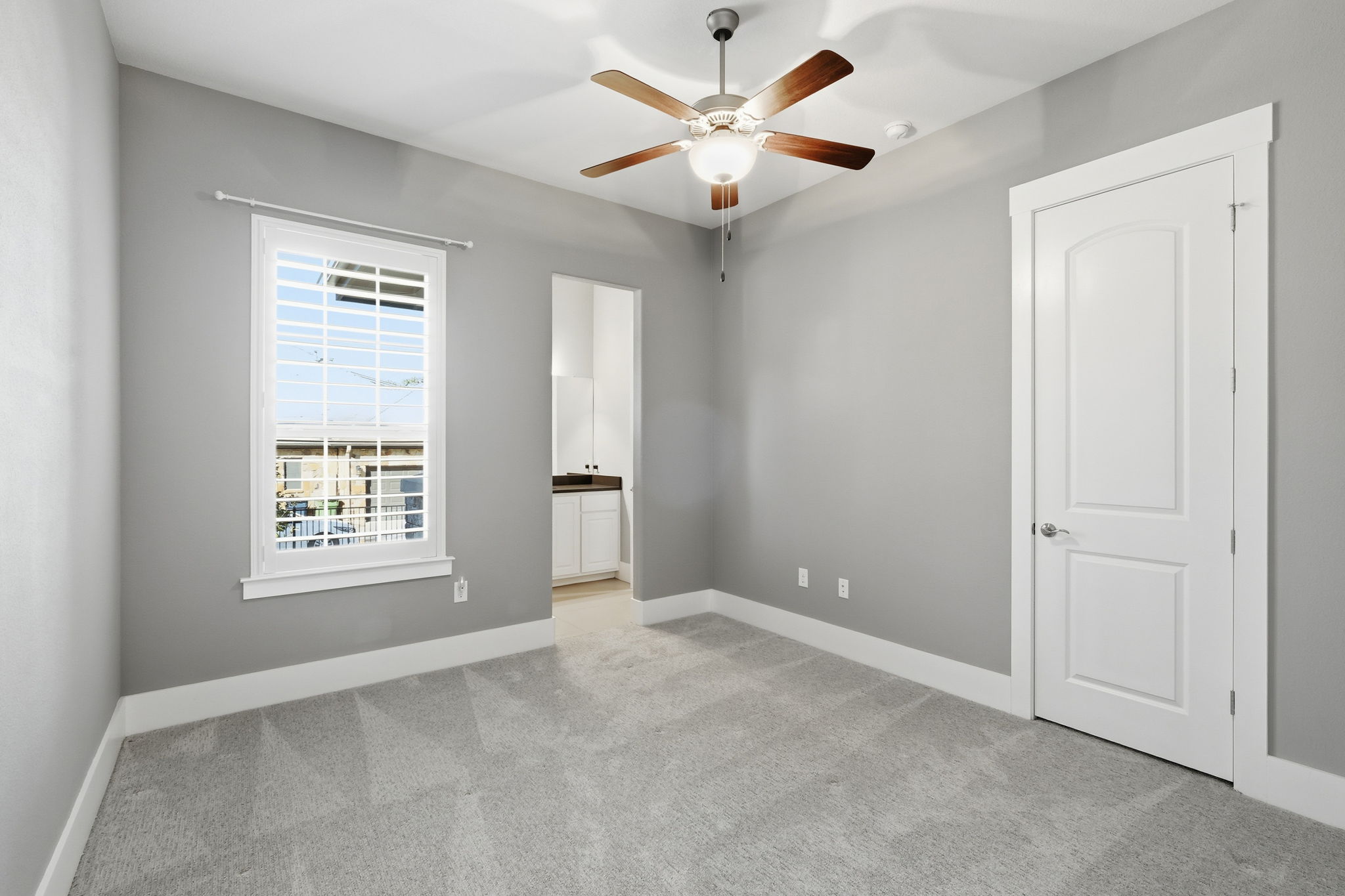 403 Highland Spring Lane Georgetown, TX 78633 - Photo 25 of 40 Unfurnished room with light carpet and ceiling fan
