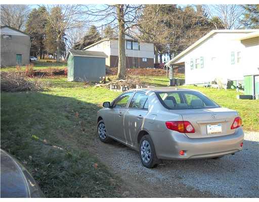 315 Lake Front Road Perryopolis, PA 15473 - Photo 6 of 8 Exterior Front. OFF STREET PARKING