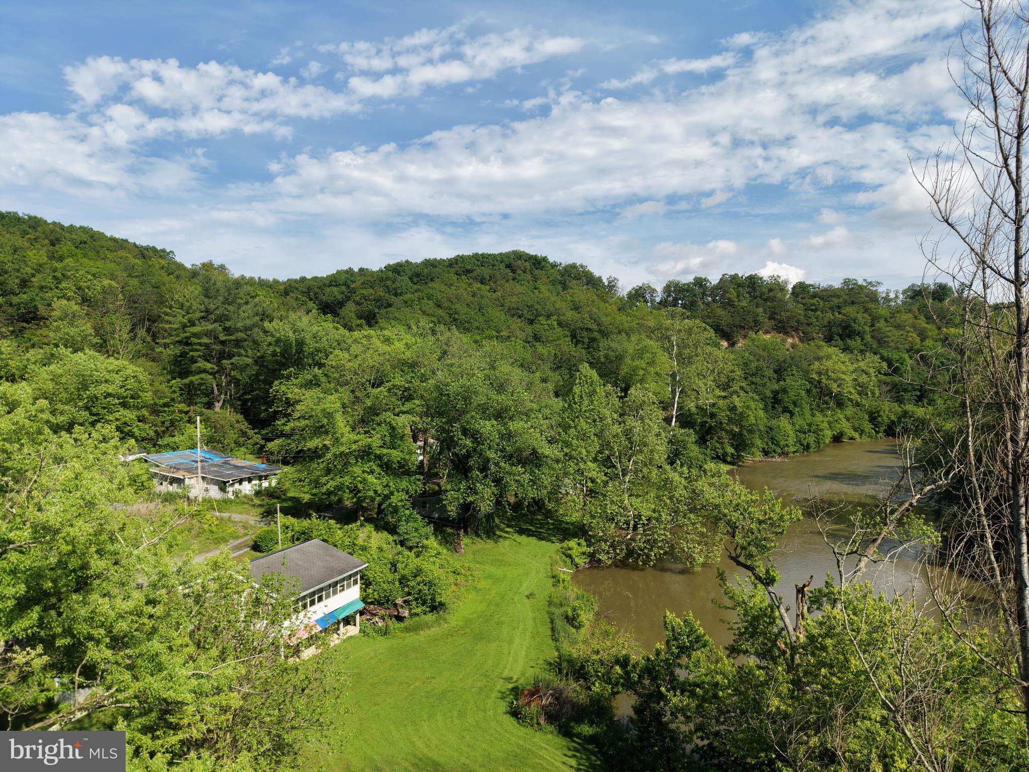 13726 Hopps Landing Road Hagerstown, MD 21740 - Photo 66 of 71 a view of a lake with green space