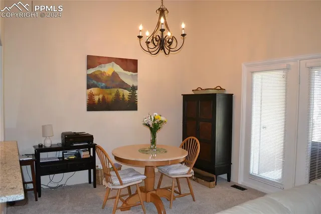 a table and chair in a room