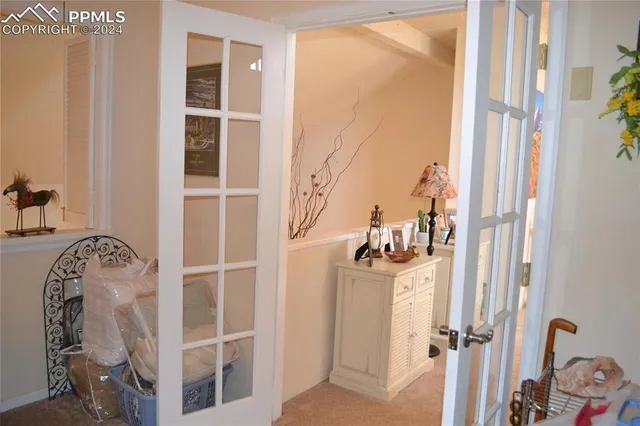 a view of a closet with storage