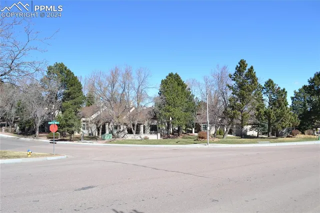 a view of a town with barn house
