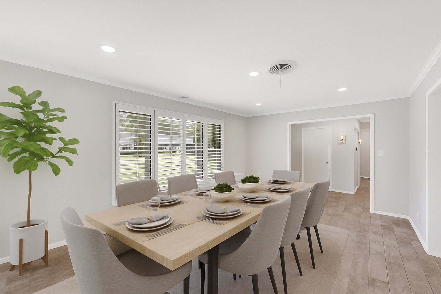 10135 Knoboak Drive Houston, TX 77080 - Photo 5 of 26 Large formal dining room positioned off the foyer with big windows dressed in plantation shutters, offering a beautiful view of the front yard. Spacious proportions allow for a full dining table and buffet, making it an ideal setting for both everyday meals and special gatherings. Note: this room has been virtually staged (there is no