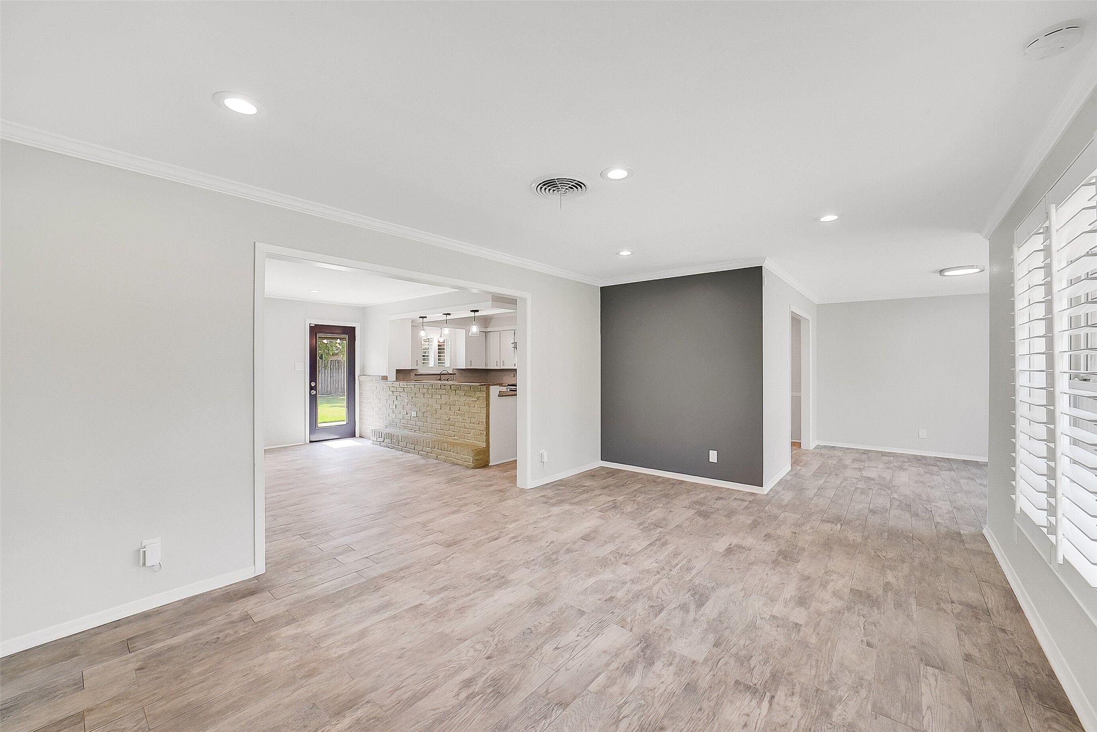 10135 Knoboak Drive Houston, TX 77080 - Photo 6 of 26 Another view of the dining room looking towards the flex room on the right (flex room makes a perfect study, formal living or dining or even a playroom!). To the left leads to the family room and kitchen.