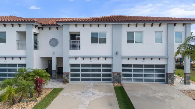 a front view of a house with a large space