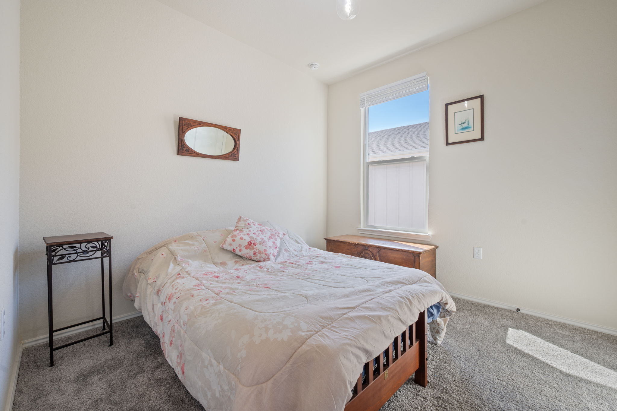 100 Bristol Cove Georgetown, TX 78633 - Photo 20 of 31 a bedroom with a bed and a window