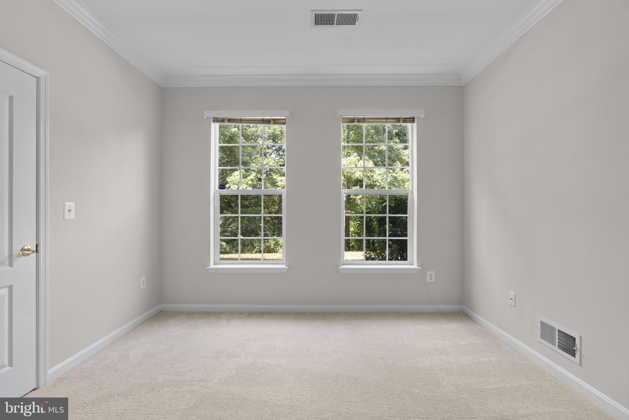 7315 Maplecrest Road, Unit 104 Elkridge, MD 21075 - Photo 26 of 58 an empty room with a window