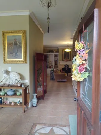 a store room with furniture and a chandelier