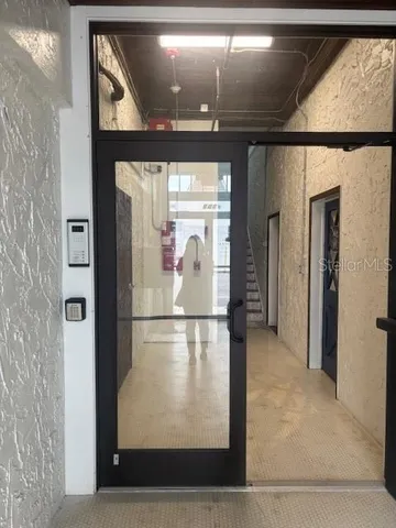 a refrigerator freezer sitting inside of a kitchen