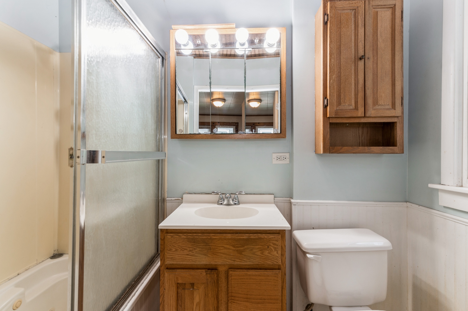 1350 Ridge Road Homewood, IL 60430 - Photo 8 of 10 a bathroom with a sink and mirror