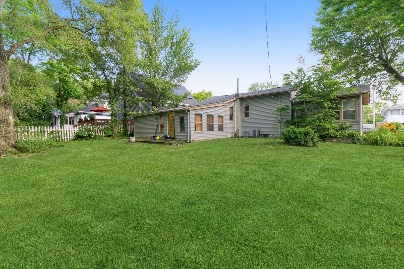 1350 Ridge Road Homewood, IL 60430 - Photo 10 of 10 a view of a house with a big yard and large trees