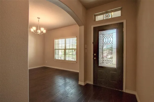 an empty room that has a window