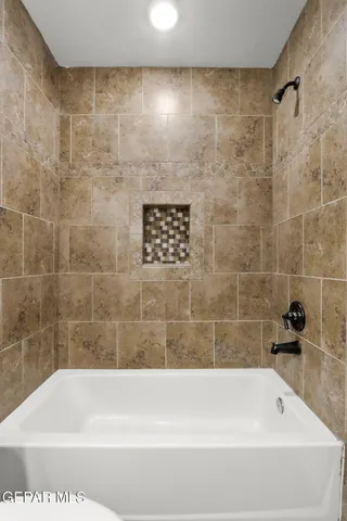 a bathroom with a bathtub