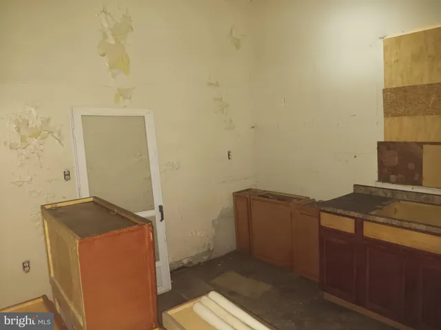 a bathroom with a sink and a bath tub