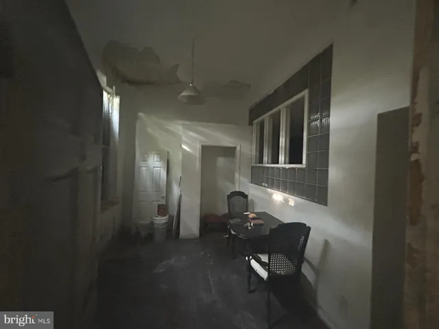 a kitchen with stainless steel appliances a refrigerator and a stove