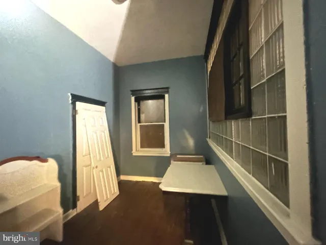 a room with cabinets and flat screen tv