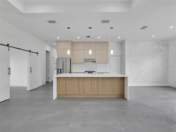 a view of kitchen and kitchen island