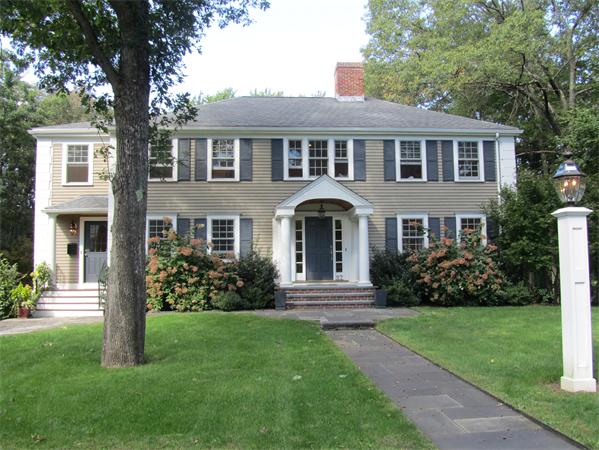 27 Yarmouth Road Wellesley, MA 02481 - Photo 1 of 1 a front view of a house with a yard