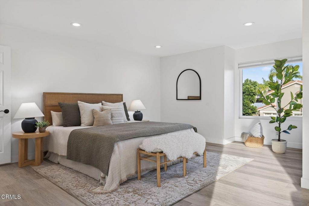 4975 North Buttercreek Road Moorpark, CA 93021 - Photo 24 of 47 a bedroom with bed and a potted plant