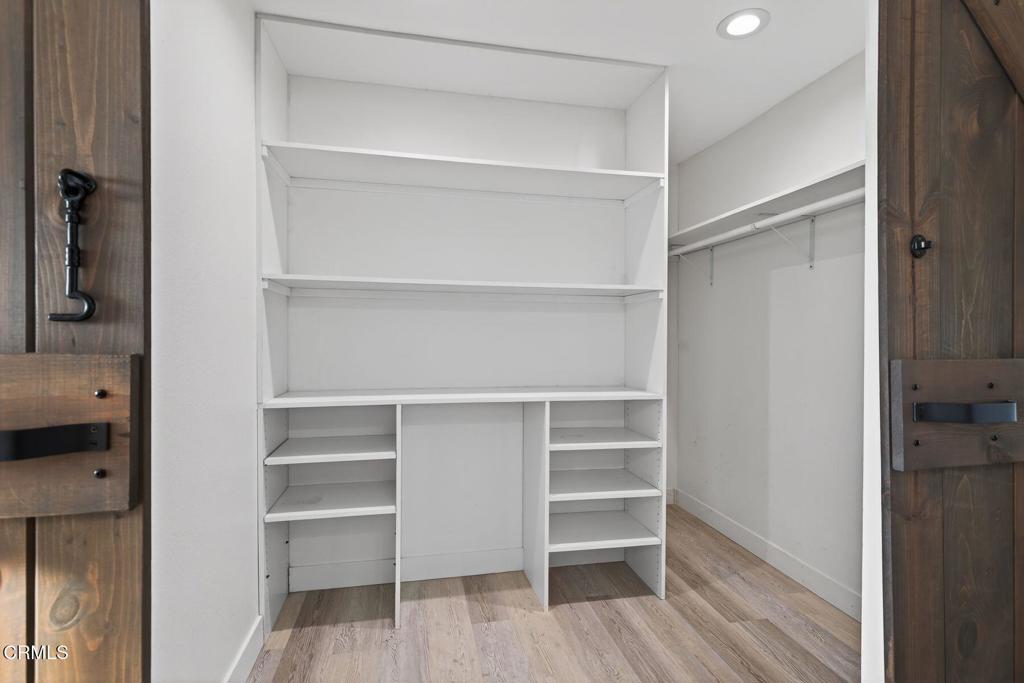 4975 North Buttercreek Road Moorpark, CA 93021 - Photo 29 of 47 a view of walk in closet with empty racks