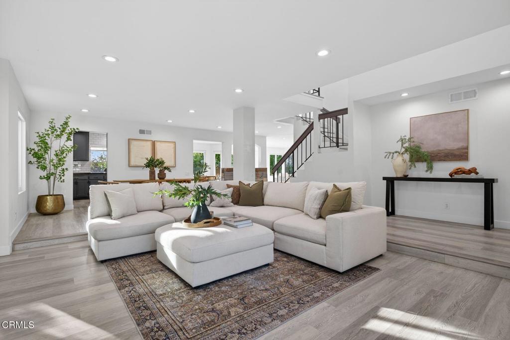 4975 North Buttercreek Road Moorpark, CA 93021 - Photo 3 of 47 a living room with furniture and kitchen view