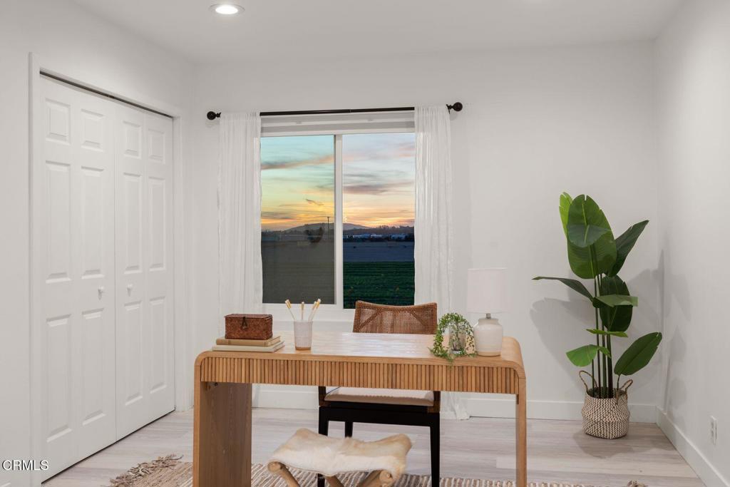 4975 North Buttercreek Road Moorpark, CA 93021 - Photo 31 of 47 a view of a dining room with furniture window and wooden floor