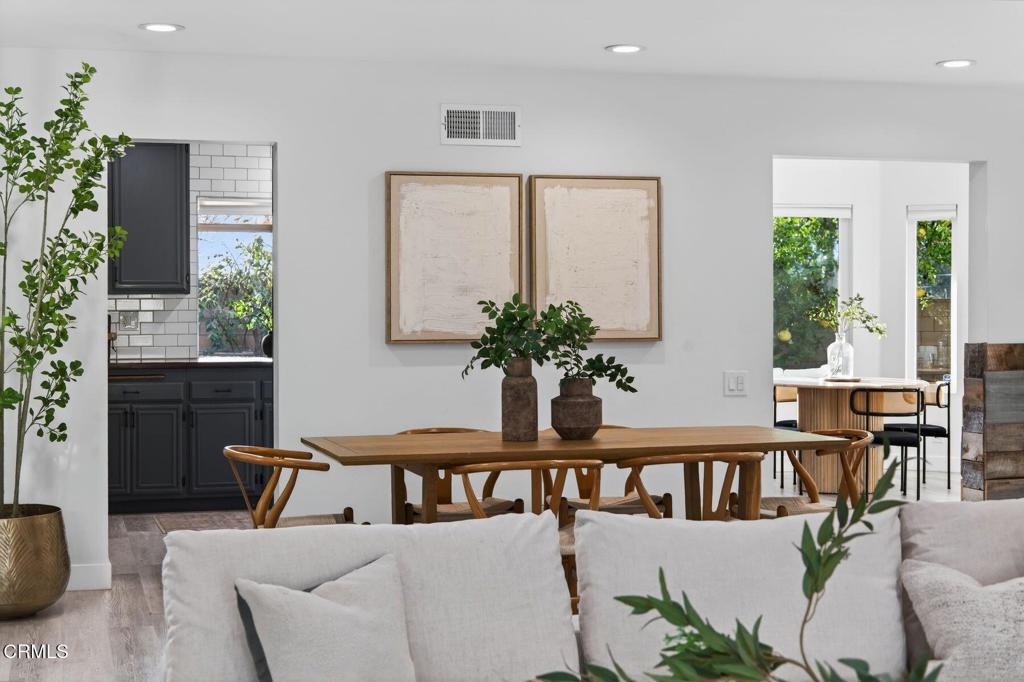 4975 North Buttercreek Road Moorpark, CA 93021 - Photo 5 of 47 a view of a livingroom with furniture and a potted plant