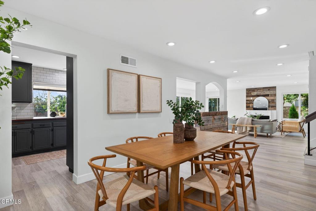 4975 North Buttercreek Road Moorpark, CA 93021 - Photo 6 of 47 a view of a dining room with furniture and wooden floor