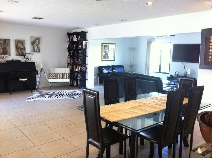 7488 Malibu Crescent Boca Raton, FL 33433 - Photo 4 of 12 dining area and living room and family r