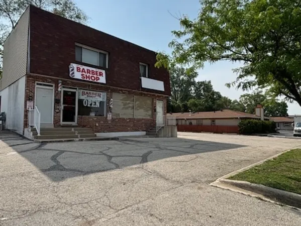 a sign that is on the side of a building