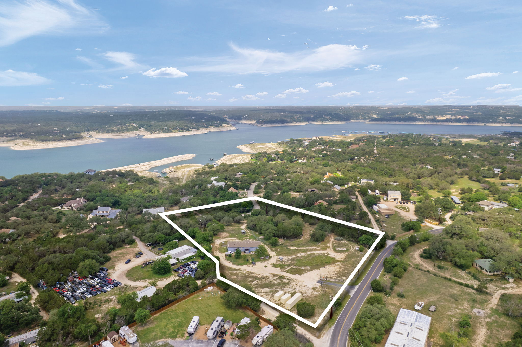 5002 Doss Road Austin, TX 78734 - Photo 8 of 20 an aerial view of residential houses with outdoor space and ocean view