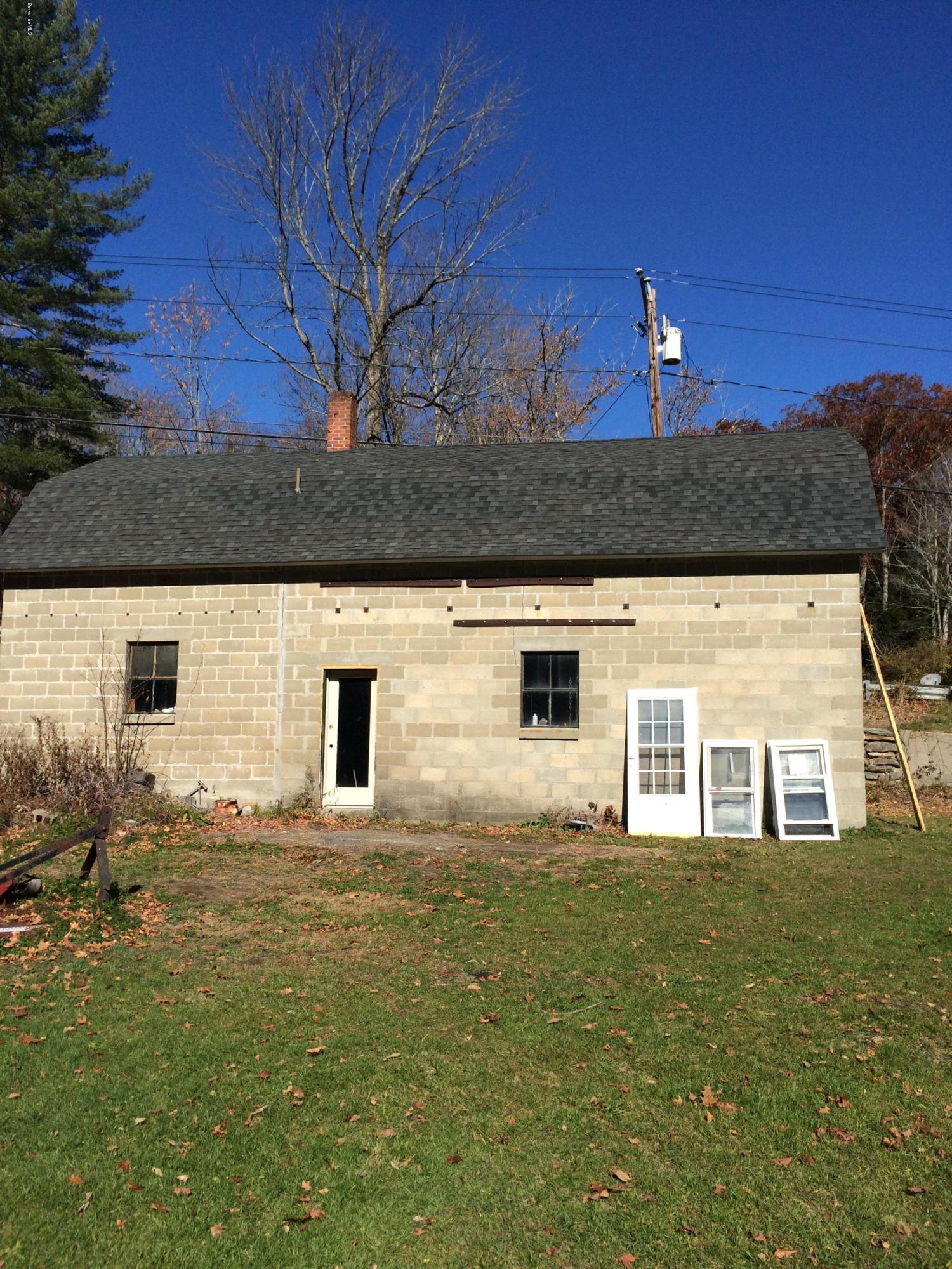 124 Sandisfield Road Sandisfield, MA 01255 - Photo 13 of 15 a view of a house with a yard