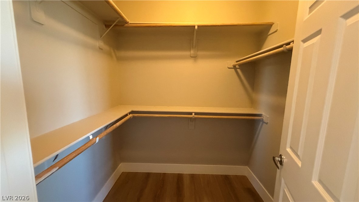 9453 Alma Ridge Avenue Las Vegas, NV 89178 - Photo 12 of 25 Functional closet space with ample shelving and hanging rods to organize your wardrobe.