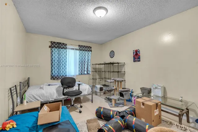 a bathroom with a sink vanity and mirror